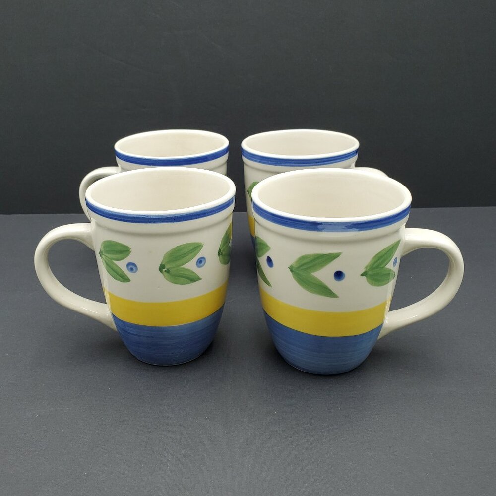 Trisa Trs4 Mugs Trisa Blue Yellow Bands Green Leaves Mugs